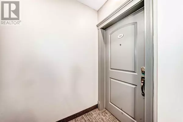 Calgary, AB T2Z4P3,202, 8 Prestwick Pond Terrace SE