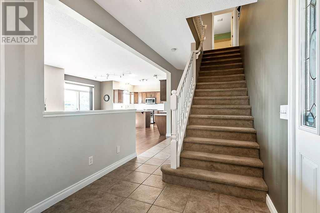 Okotoks, AB T1S0B7,521 Westmount Close