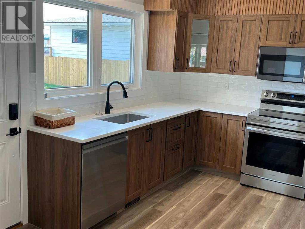 Calgary, AB T2H1C2,71 Fyffe Road SE