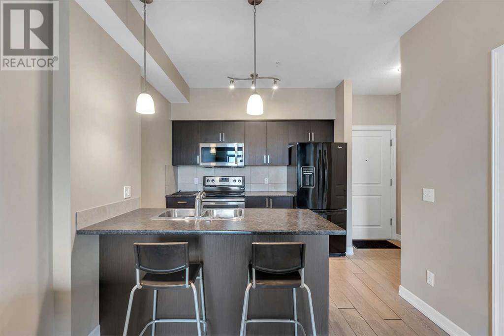 311, 117 Copperpond Common SE, Calgary, AB T2Z5E6