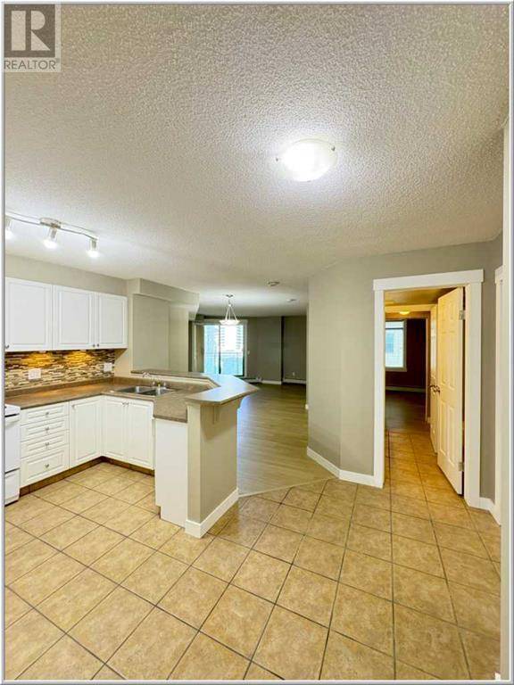 Calgary, AB T2P5J4,604, 1121 6 Avenue SW