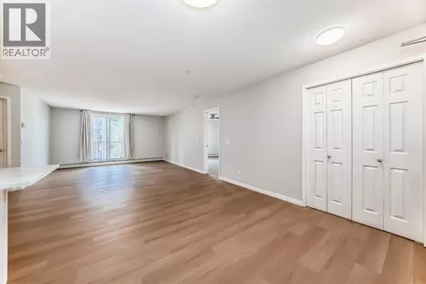Calgary, AB T3K5J8,207, 9 Country Village Bay NE