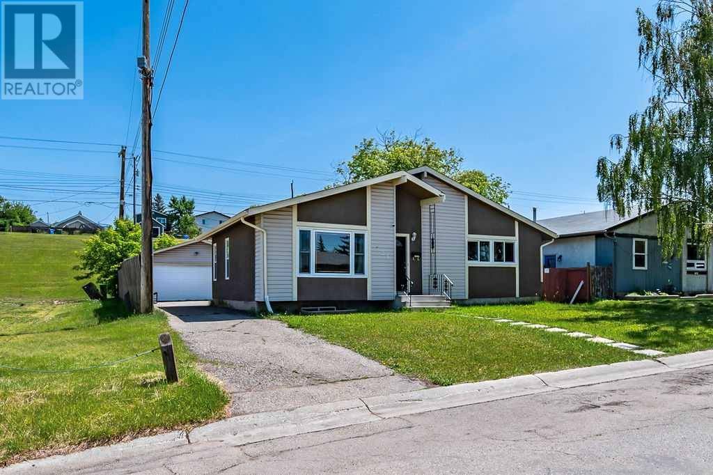 Calgary, AB T2C1H5,724 Olympia Drive SE