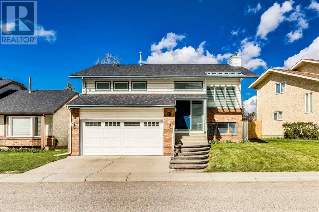 31 Woodmont Way SW, Calgary, AB T2W4L7