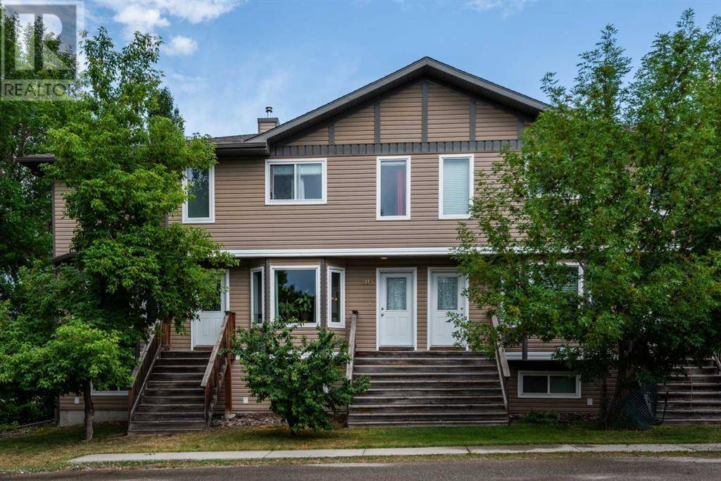 205, 30 Wellington Cove, Strathmore, AB T1P1Z4