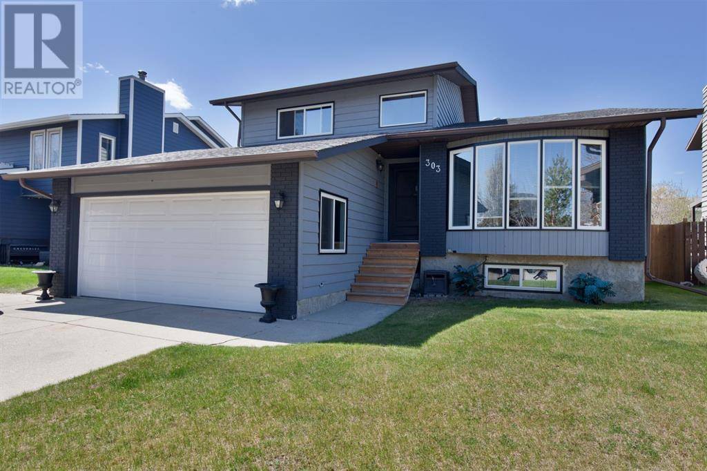 Okotoks, AB T1S1L9,303 Woodside Place