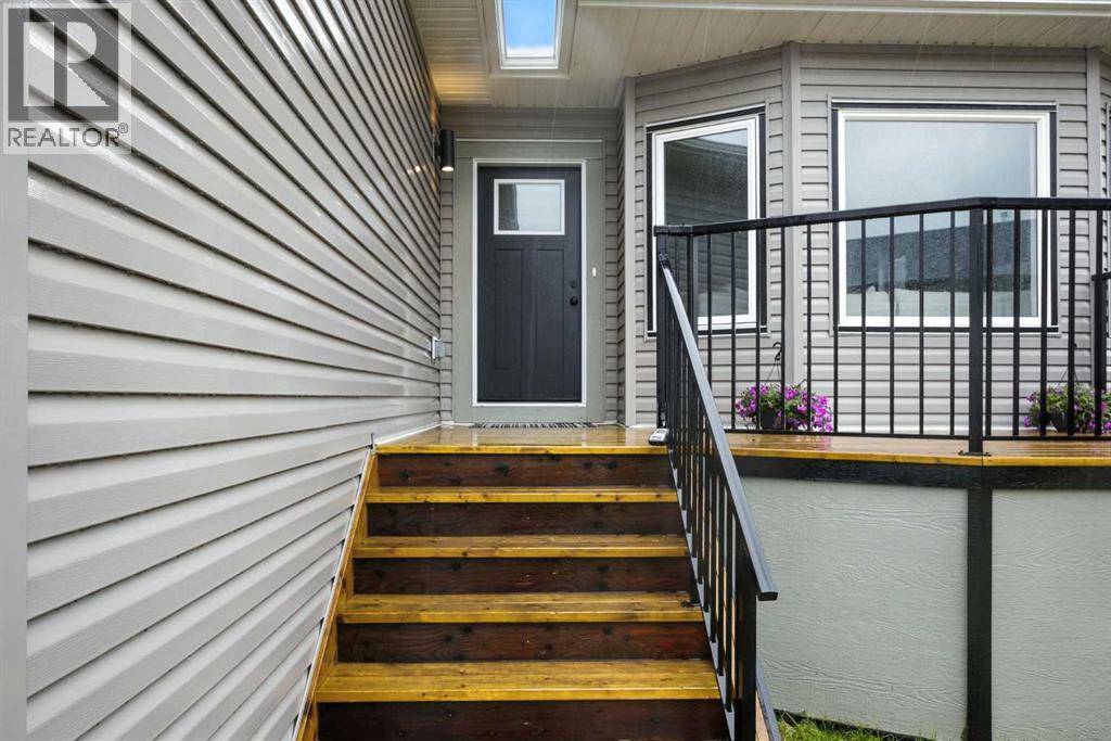 Okotoks, AB T1S1N7,335 Sheep River Place