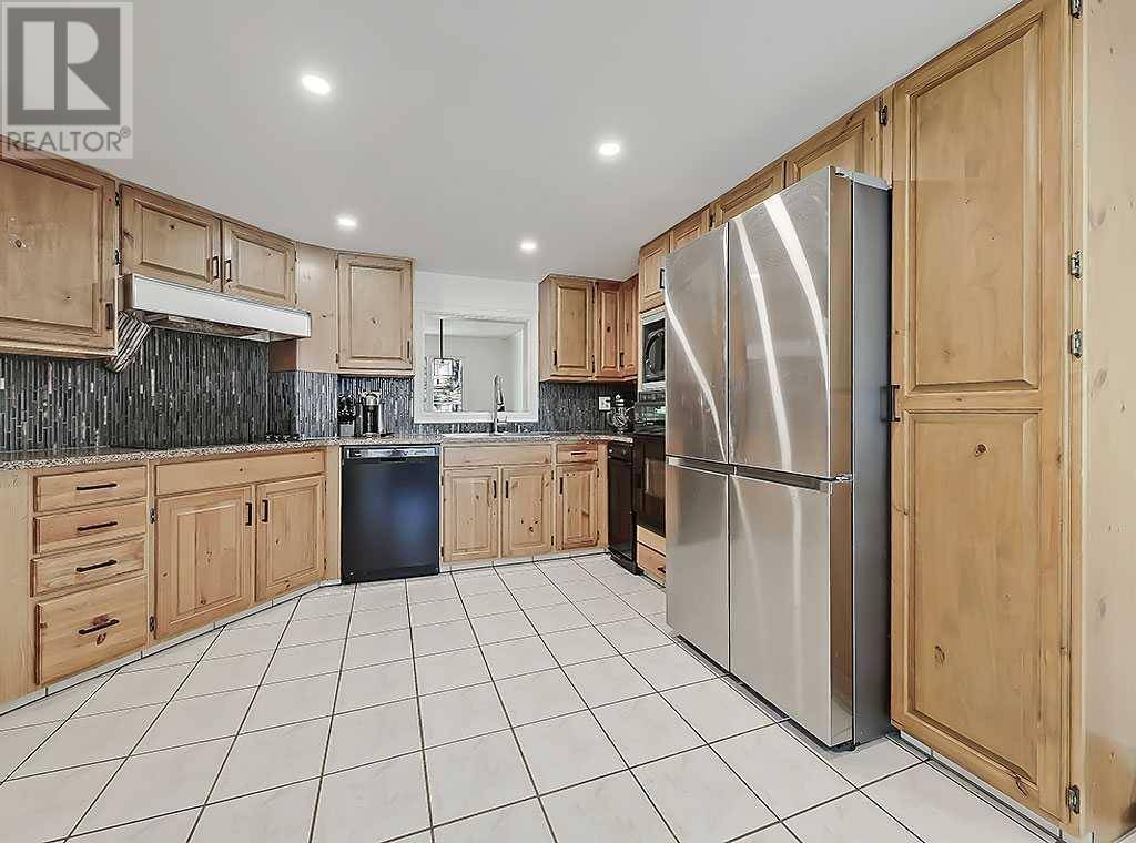 Calgary, AB T3H1M3,4, 448 Strathcona Drive SW