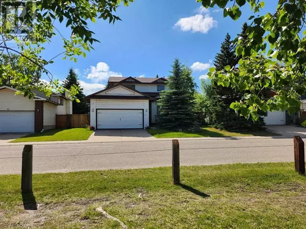 59 Woodmont Way SW, Calgary, AB T2W4L7