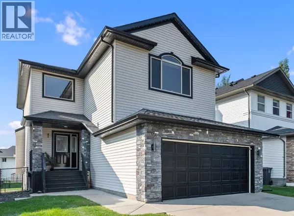 95 Crystal Shores Road, Okotoks, AB T1S2H9