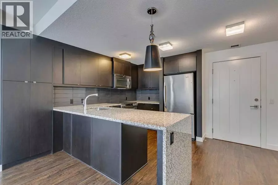 107, 25 Aspenmont Heights SW, Calgary, AB T3H0E4