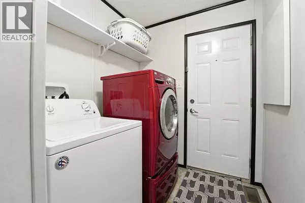 Okotoks, AB T1S1M4,113 Heritage Drive