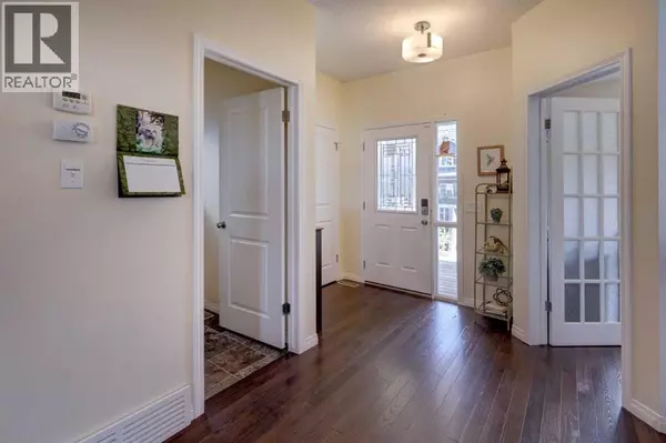 Cochrane, AB T4C0T3,24 Fireside Burrow