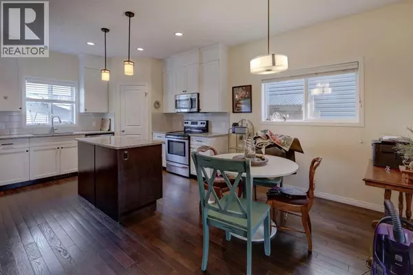 Cochrane, AB T4C0T3,24 Fireside Burrow