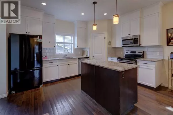 Cochrane, AB T4C0T3,24 Fireside Burrow