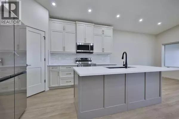 Raymond, AB T0K2S0,112 E 300 S