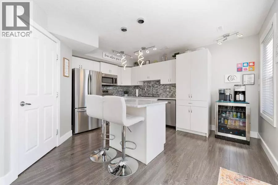 310, 50 Westland Road, Okotoks, AB T1S2H4