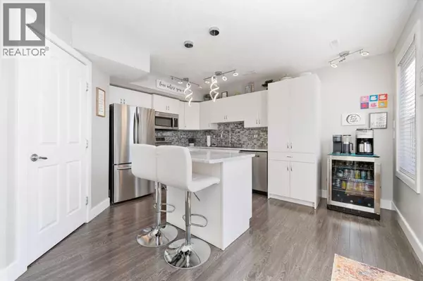 310, 50 Westland Road, Okotoks, AB T1S2H4