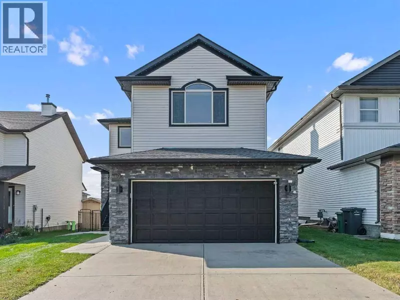 95 Crystal Shores Road, Okotoks, AB T1S2H9
