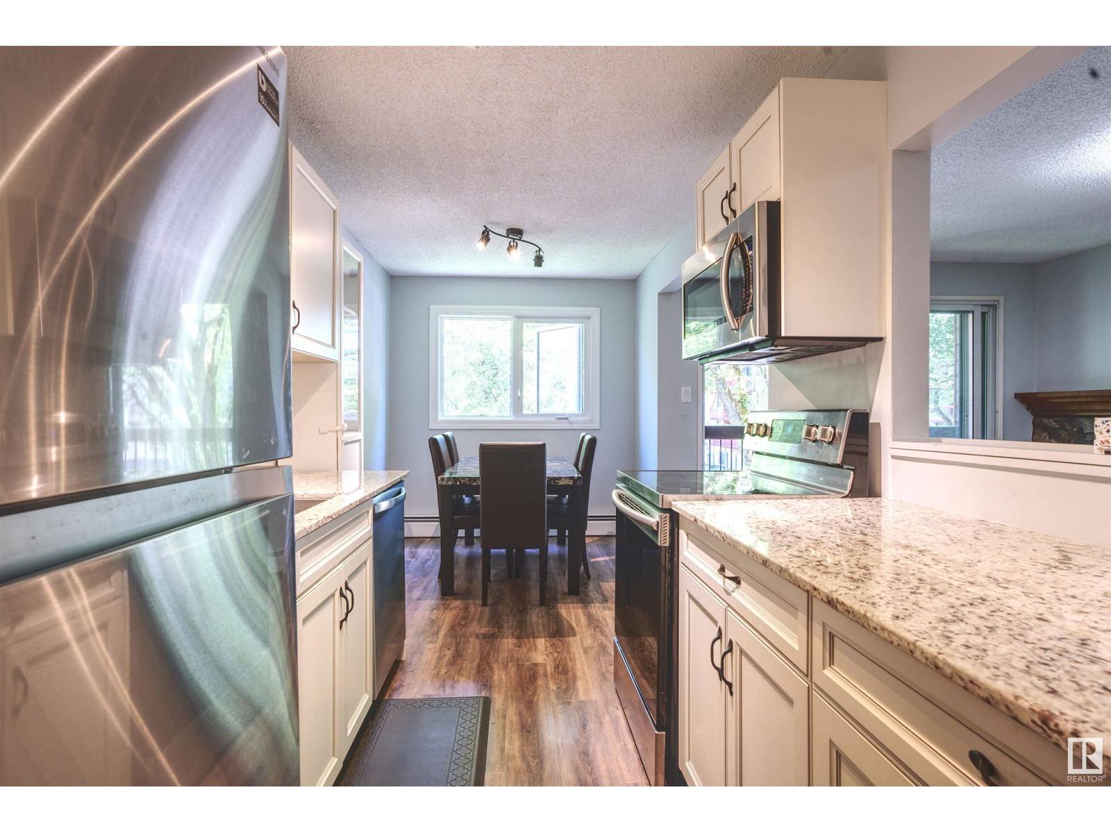 Edmonton, AB T5K1Y9,#21 10160 119 ST NW