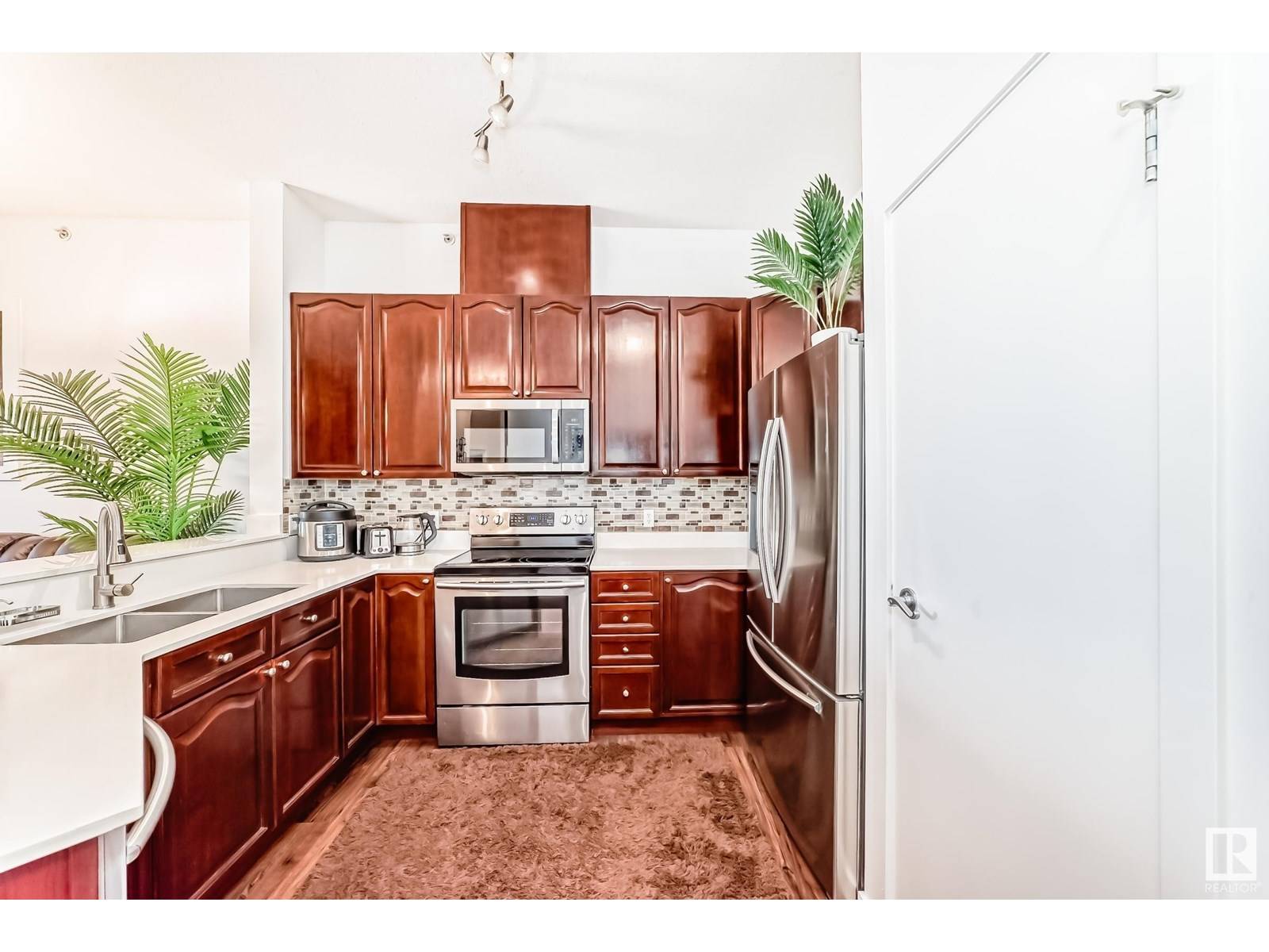 Edmonton, AB T5Y3J4,#412 4312 139 AV NW