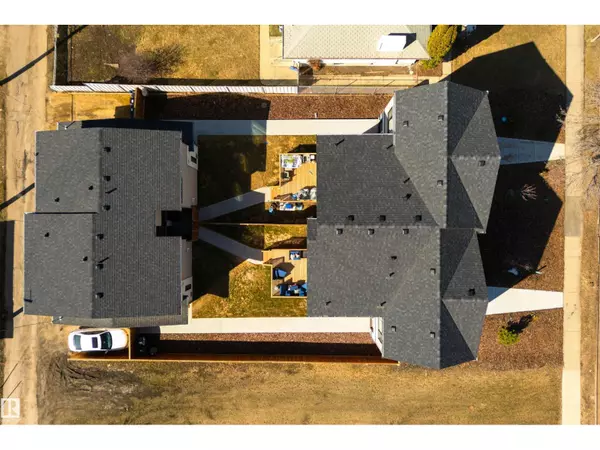 Edmonton, AB T6C0H9,8311 & 8313 76 AV NW