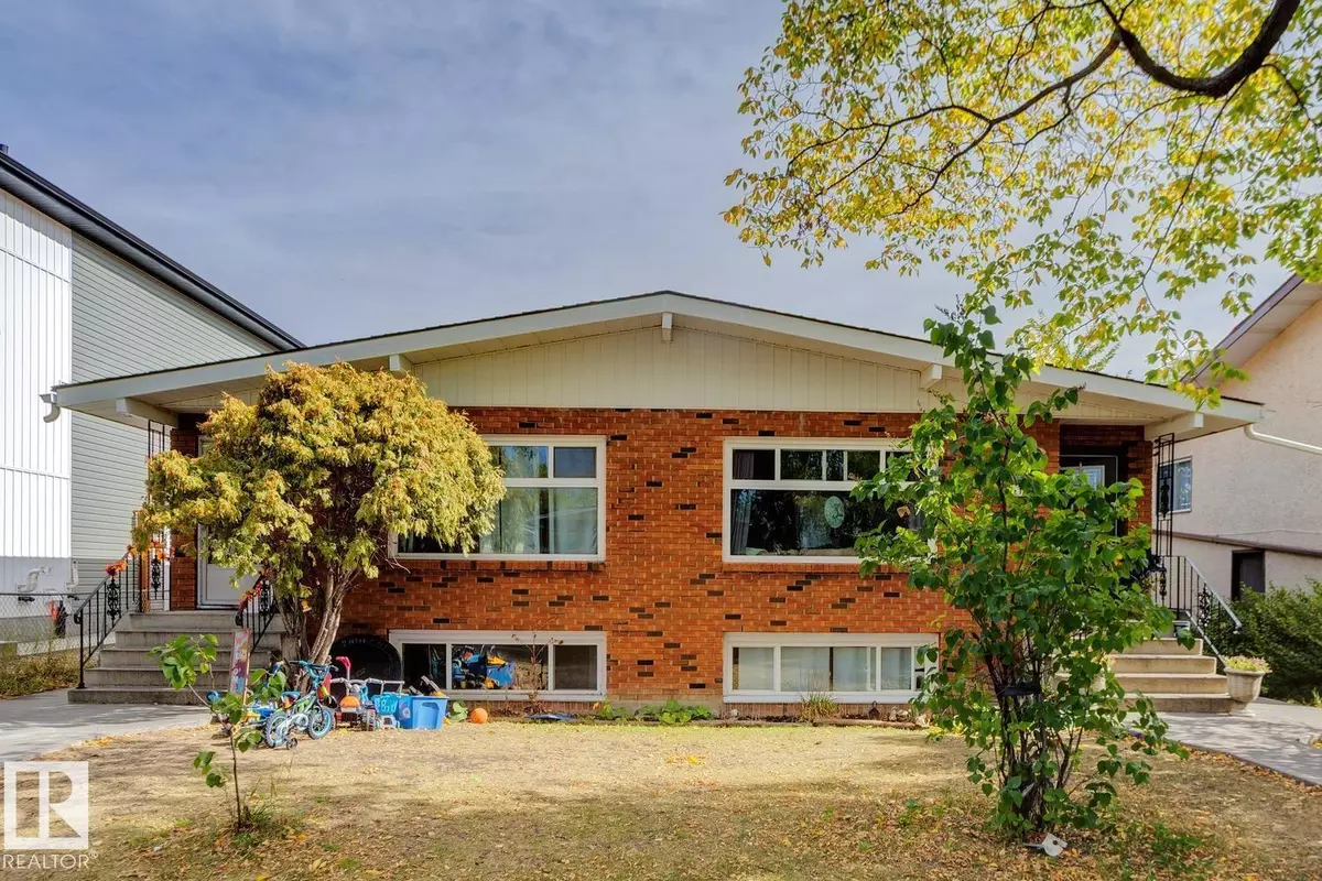 Edmonton, AB T5G2J7,12007/12009 103 ST NW NW