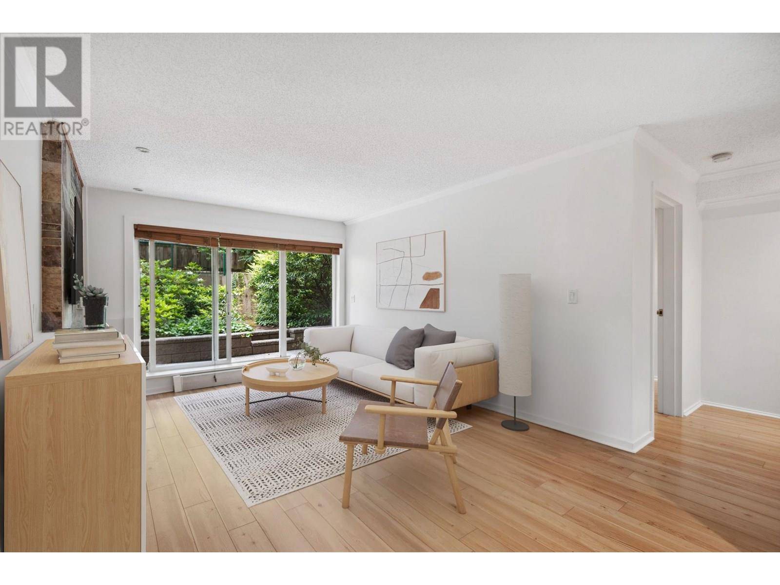 Vancouver, BC V6E1J3,1169 NELSON ST #106