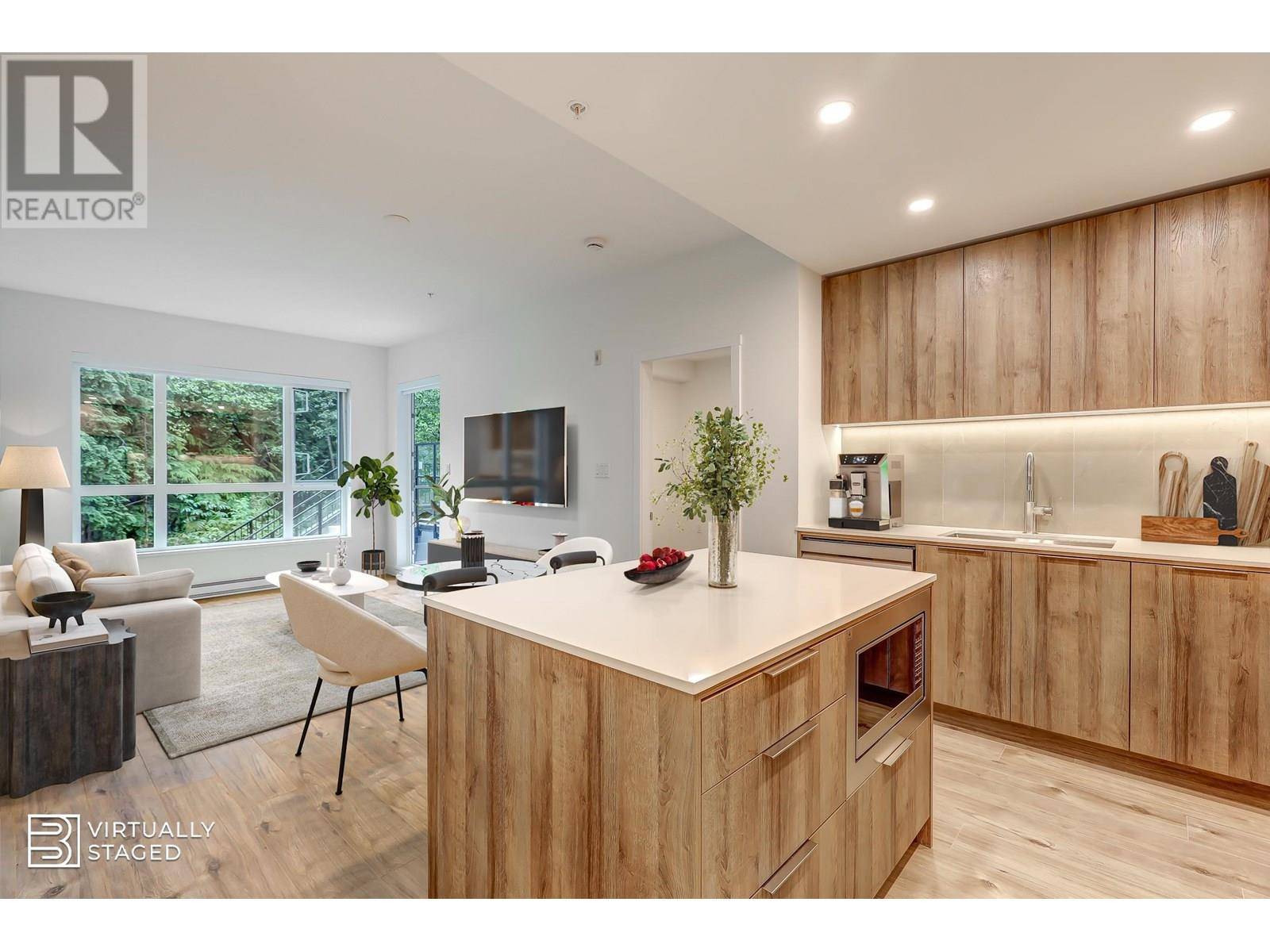 North Vancouver, BC V7G0B5,3594 MALSUM DR #206