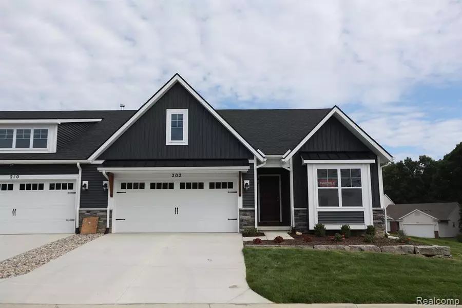 1054 CAMELLIA Circle, Howell, MI 48843 9256