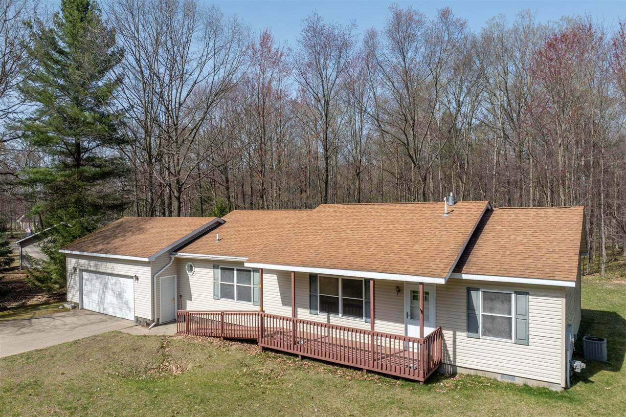 6565 Clubhouse Drive, Canadian Lakes, MI 49346