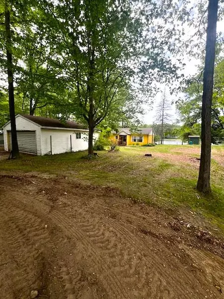 7777 N Manitonka Drive, Weidman, MI 48893