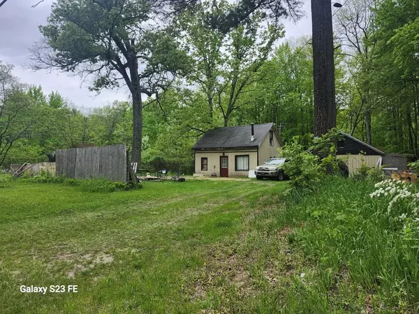 7831 Holton-Duck Lake Road,  Holton,  MI 49425