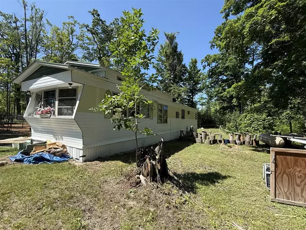 1810 Richard Road, Comins, MI 48619-9600