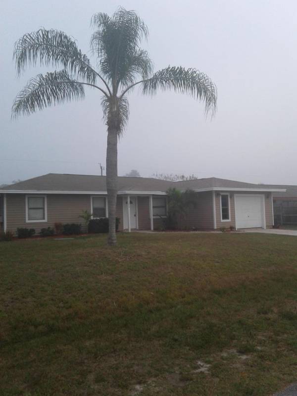 1073 SW Sudder AVE, Port Saint Lucie, FL 34953