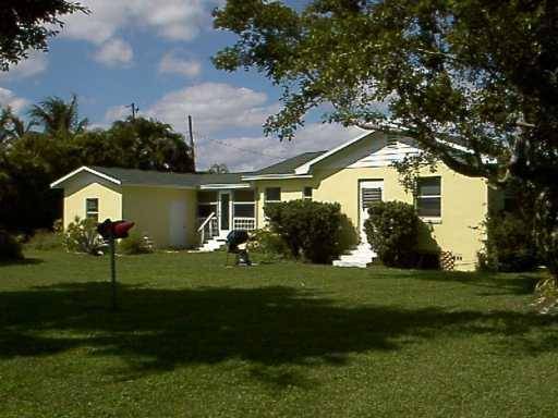 112 E Chandler RD, Cloud Lake, FL 33406