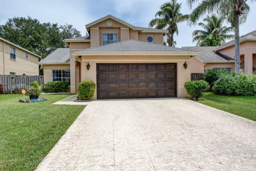 112 Heatherwood DR, Royal Palm Beach, FL 33411