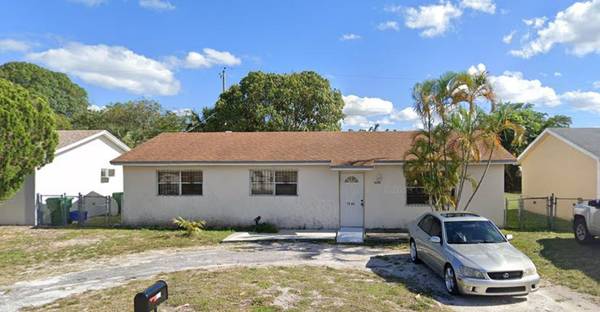 1220 Giller AVE, Mangonia Park, FL 33407