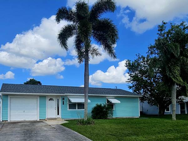 1809 SW Idaho LN, Port Saint Lucie, FL 34953