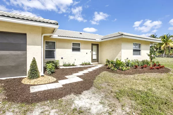 16393 E Grand National DR, The Acreage, FL 33470