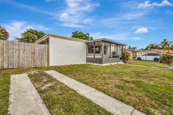 Royal Palm Beach, FL 33411,627 Camellia DR