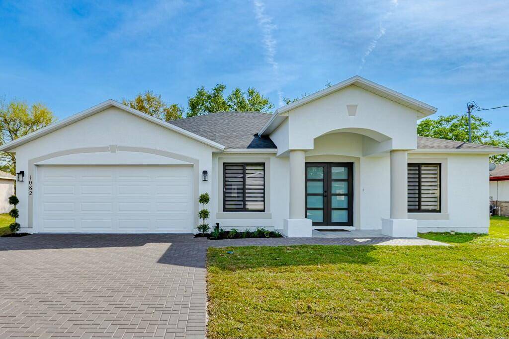 1082 SW Sudder AVE, Port Saint Lucie, FL 34953