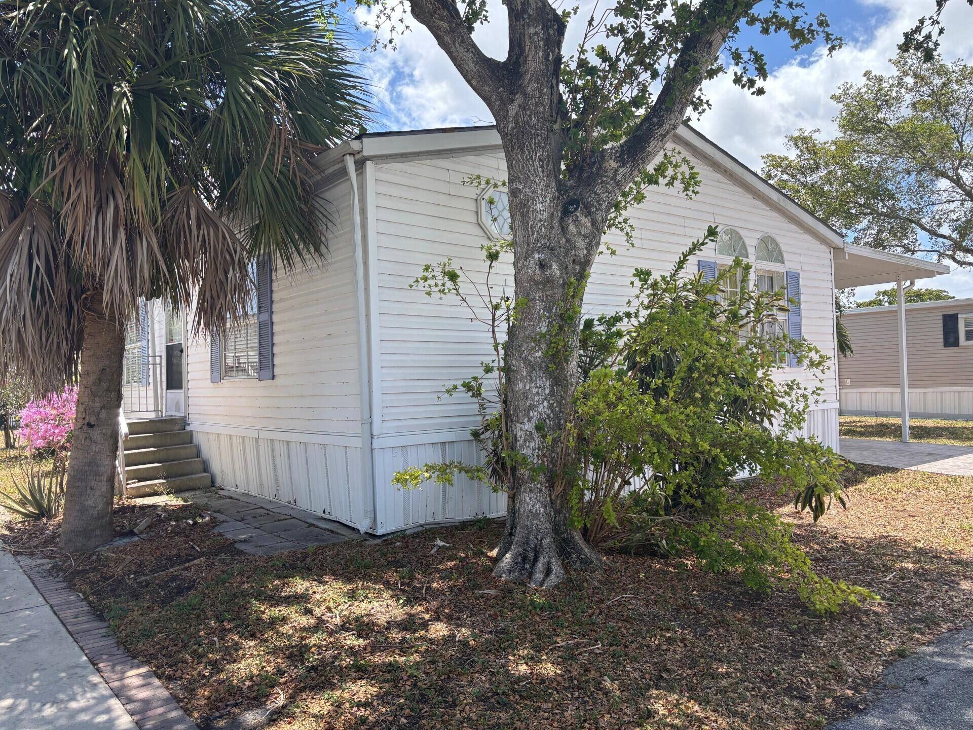 Pompano Beach, FL 33064,116 NW 50th Ct, Lot 205 CT