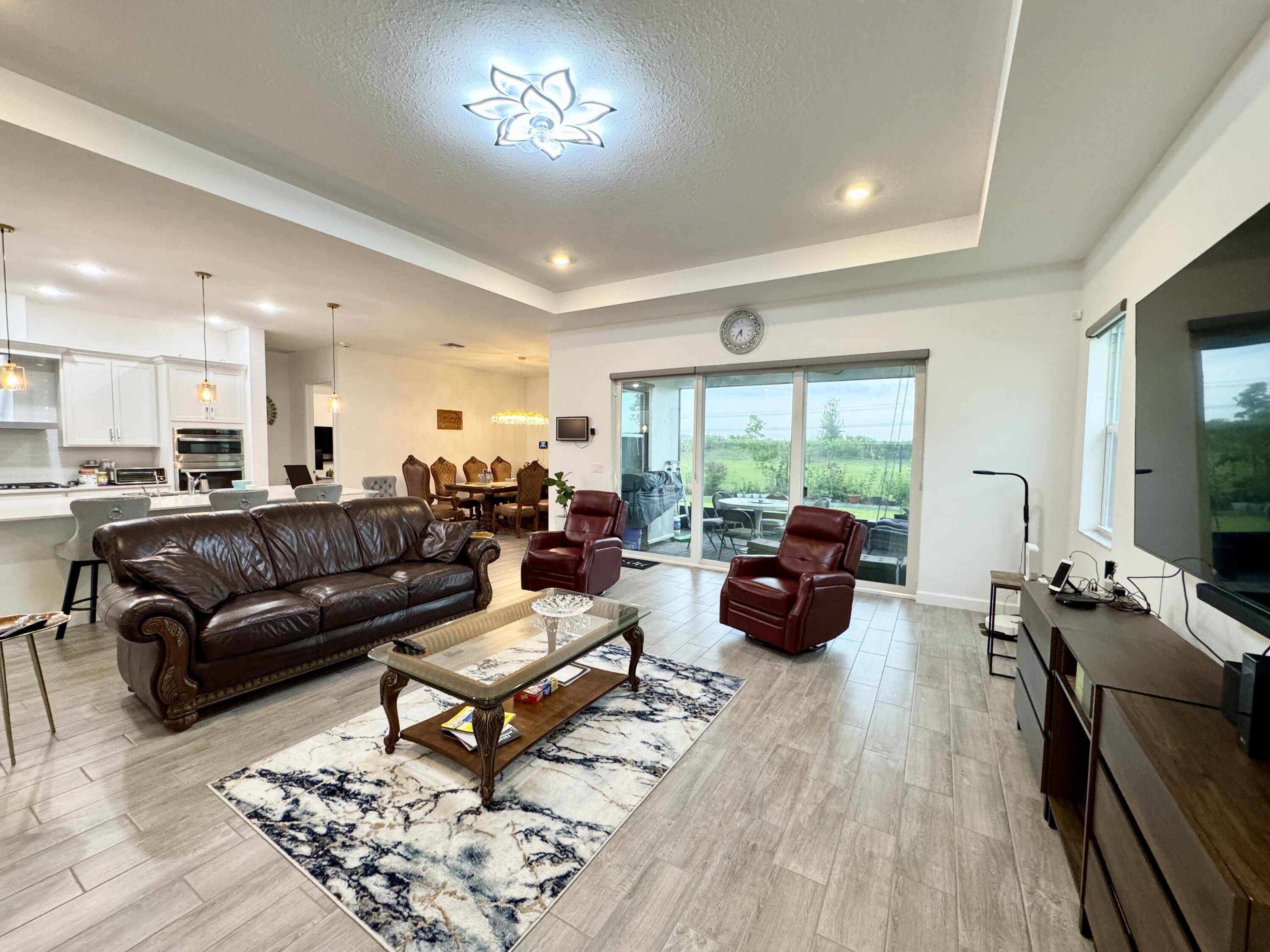 The Acreage, FL 33470,1130 Tangled Orchard TRCE