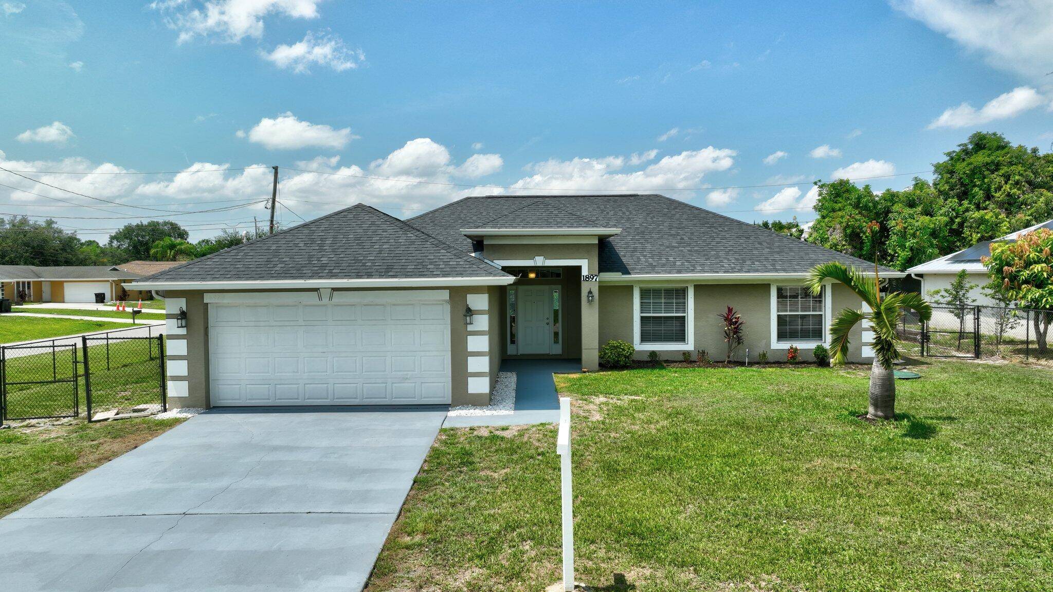1897 SW Lofgren AVE, Port Saint Lucie, FL 34953