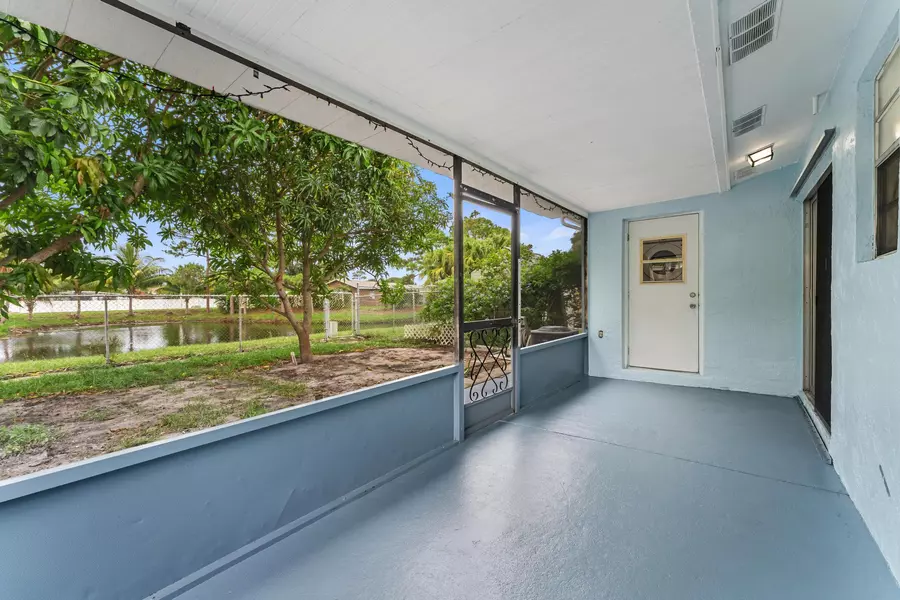 911 W Sumter RD, West Palm Beach, FL 33415