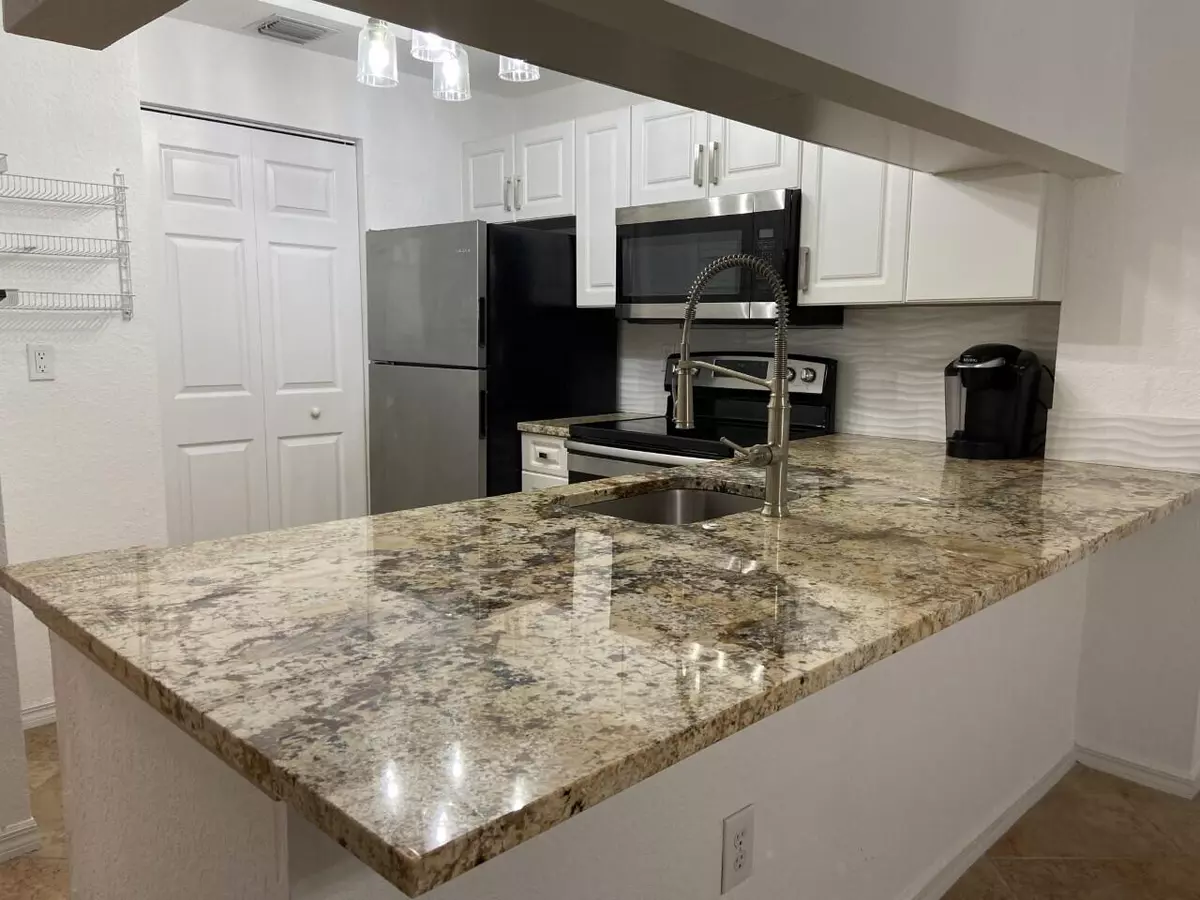 Palm Beach Gardens, FL 33410,2812 Grande Parkway 202