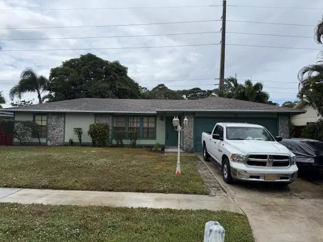 203 W Canterbury DR, Riviera Beach, FL 33407