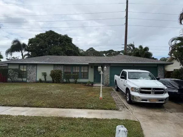 203 W Canterbury DR, Riviera Beach, FL 33407