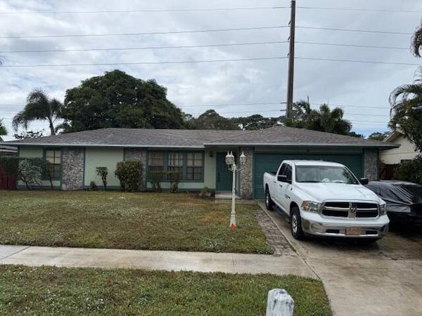 203 W Canterbury DR, Riviera Beach, FL 33407